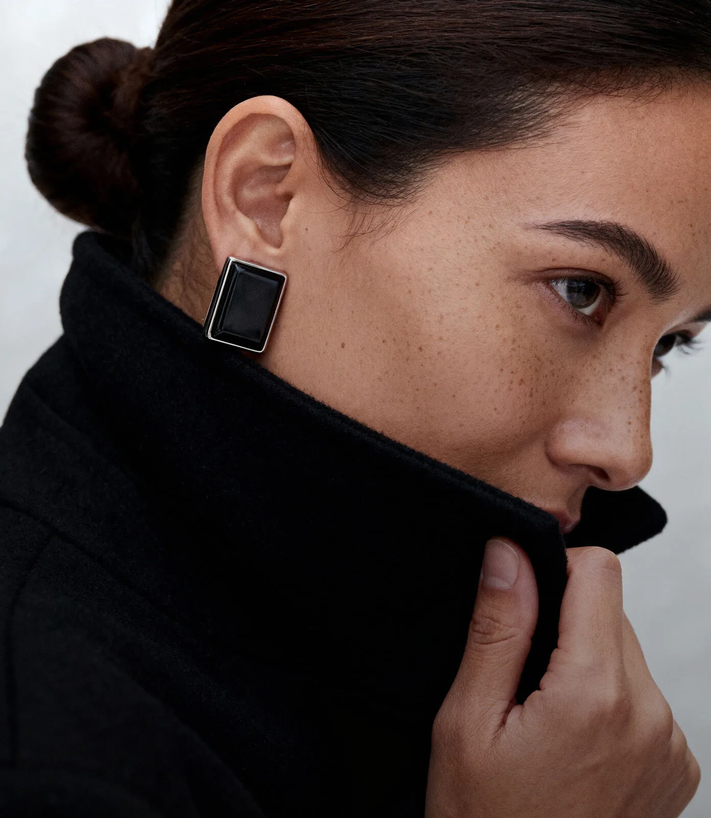 A woman in black clothing